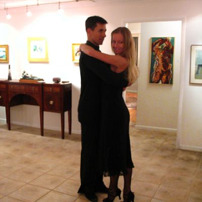 Todd and Migle in embrace.